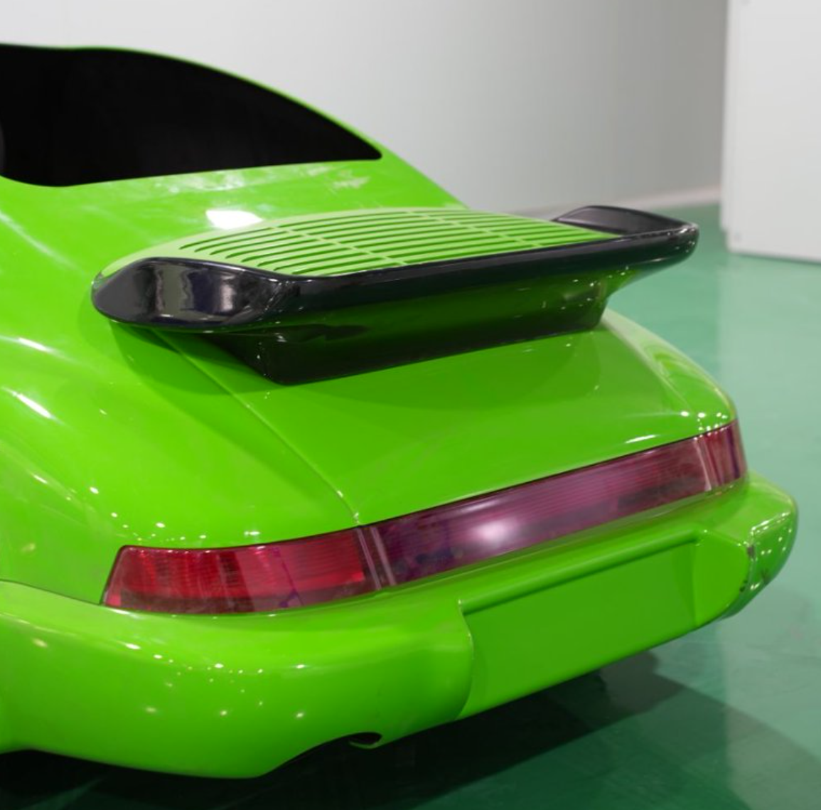 Close-up of rear spoiler and tail light