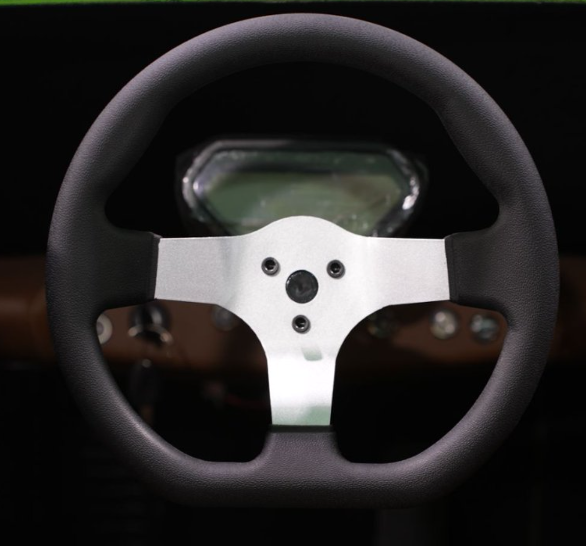 Close-up of steering wheel and dashboard